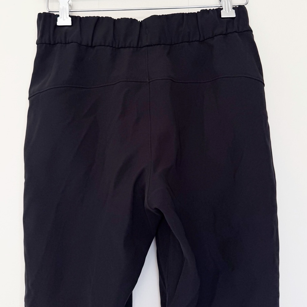 LULULEMON On the Fly 7/8 Pant Woven Black Size 4 LW5BPMS - Picture 6 of 10